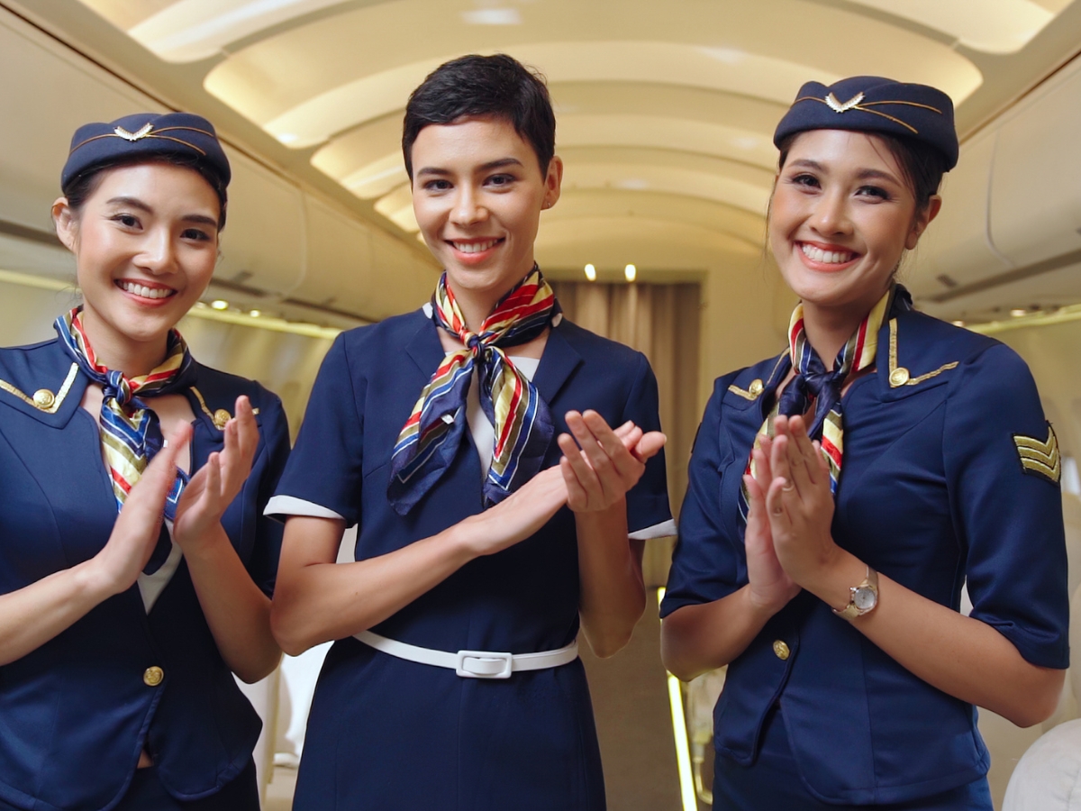 A group of air hostesses posing together